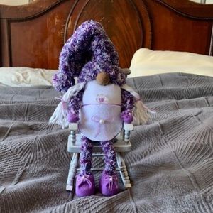 Purple Gnome in vintage chair